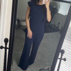 Navy blue pant jumpsuit. Worn once and drycleaned. No stains. Perfect condition.